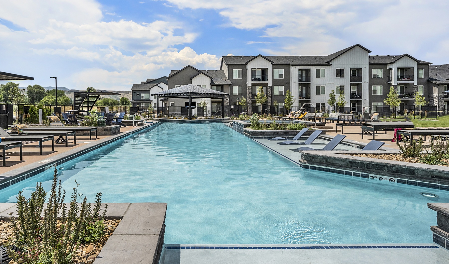 Resort style Pool with ample seating and mountain views