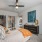 bedroom with private bathroom and walk-in closet
