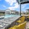 chairs and counter with pool views